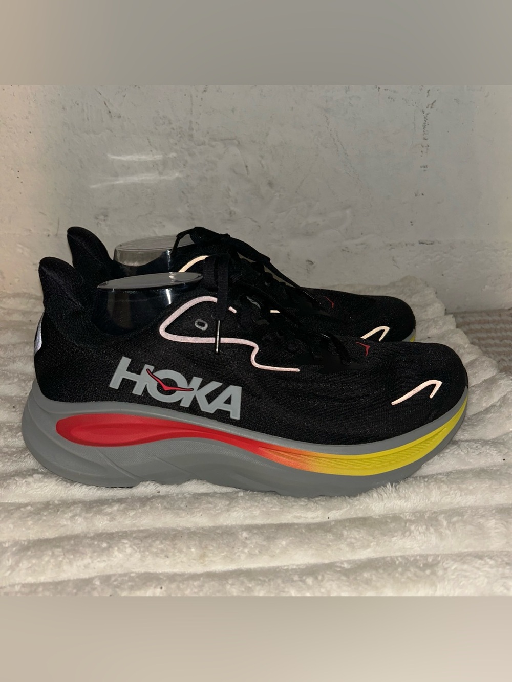 Hoka Women's Black Running Sneakers with Red and Yellow Accents